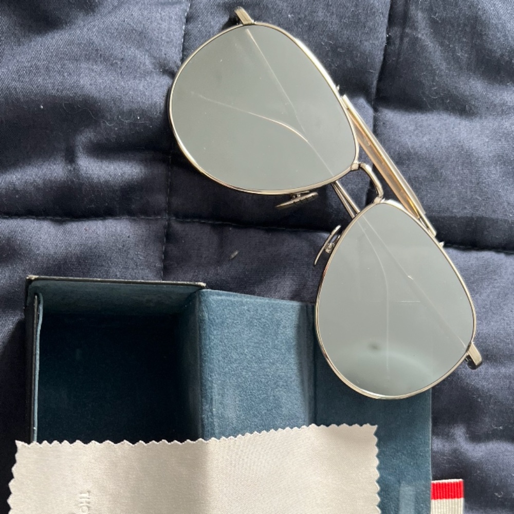 Thom Browne sunglasses featuring mirror aviator lens